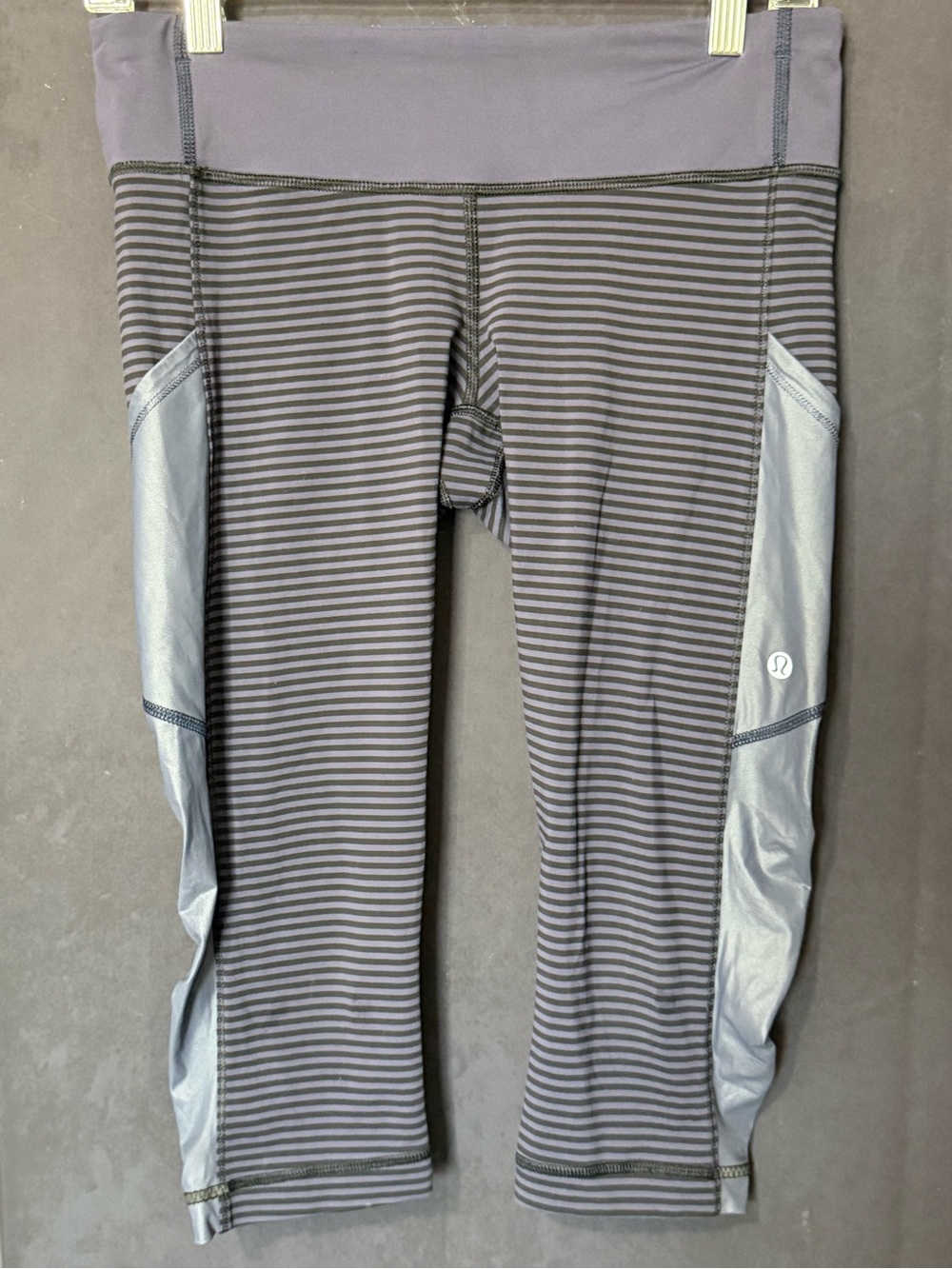 lululemon athletica navy and black striped leggings with reflective logo